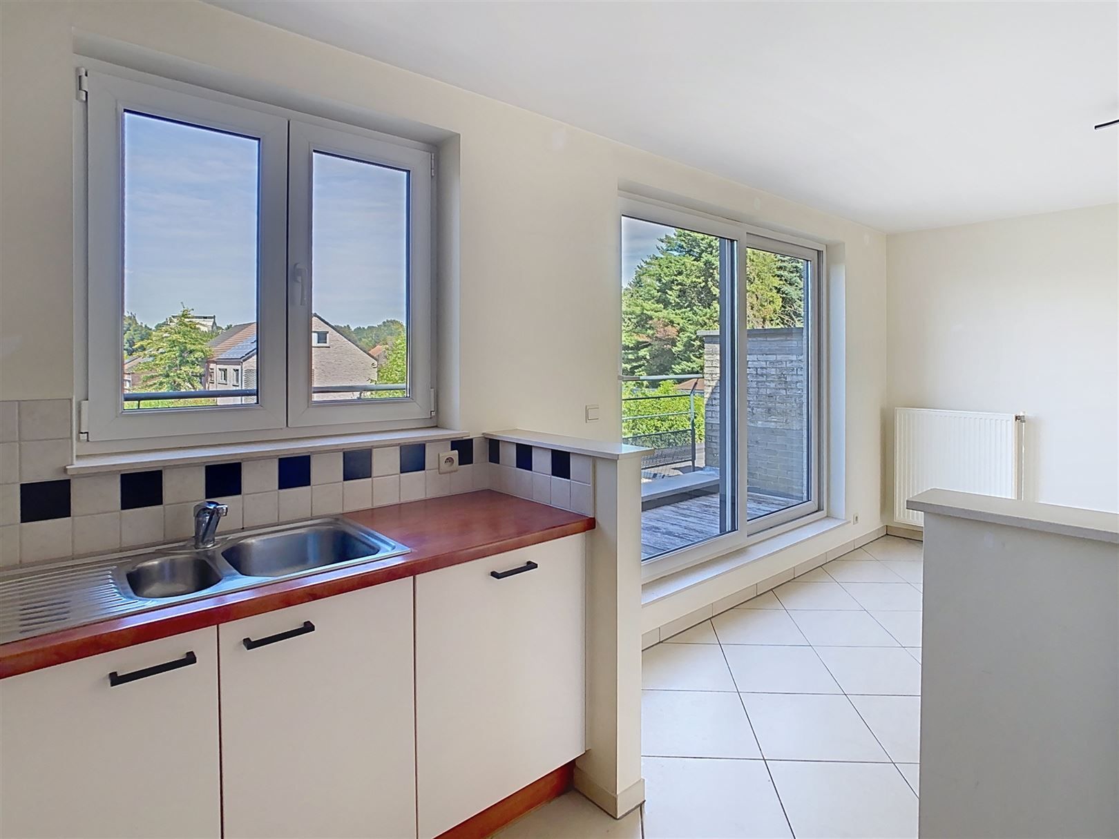 Ruim duplex app met terras, 3 slpks, parkeerplaats foto 11
