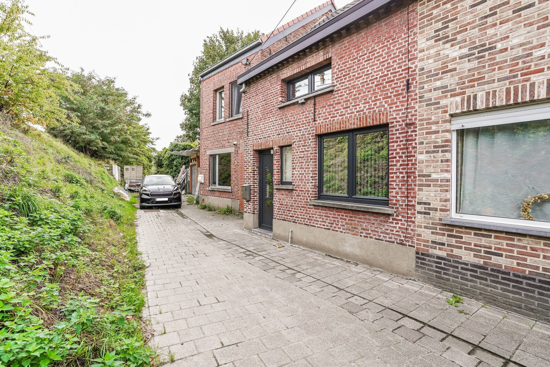 Gezellige en instapklare rijwoning te Kapelle-op-den-Bos foto 2