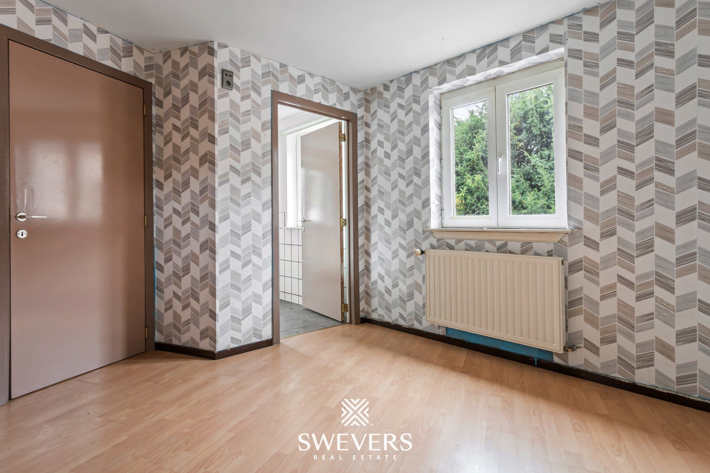 Charmante hoekwoning met potentieel in hartje Tongeren foto 12