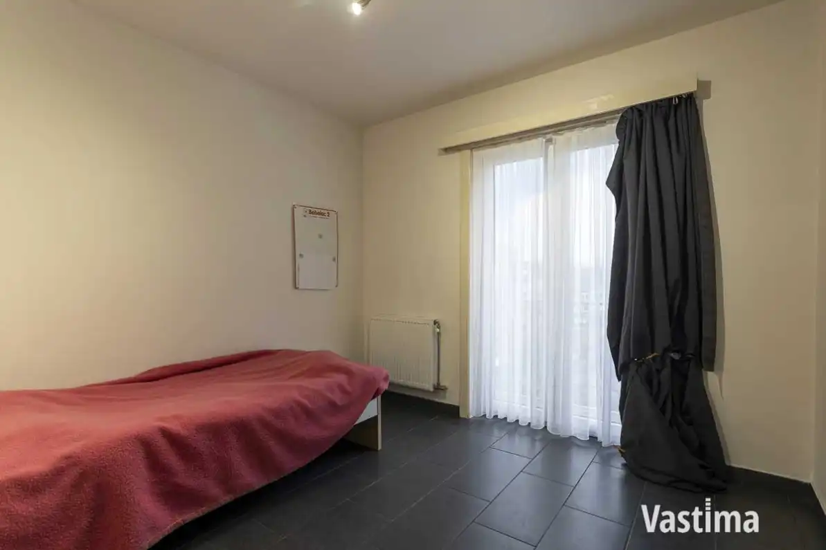 Vergunde opbrengsteigendom met 3 verhuurde appartementen foto 12
