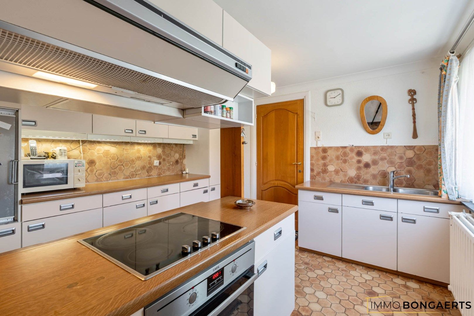 Ruime woning met drie slaapkamers  foto 9