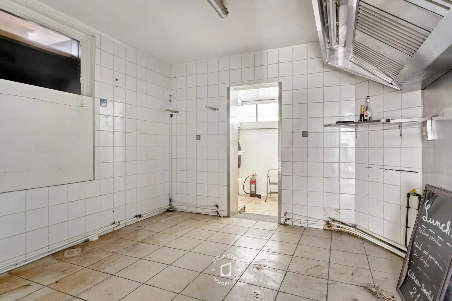 Veelzijdig renovatie- of herbestemmingsproject met zonnige stadstuin in vernieuwde Gentsestraat foto 10