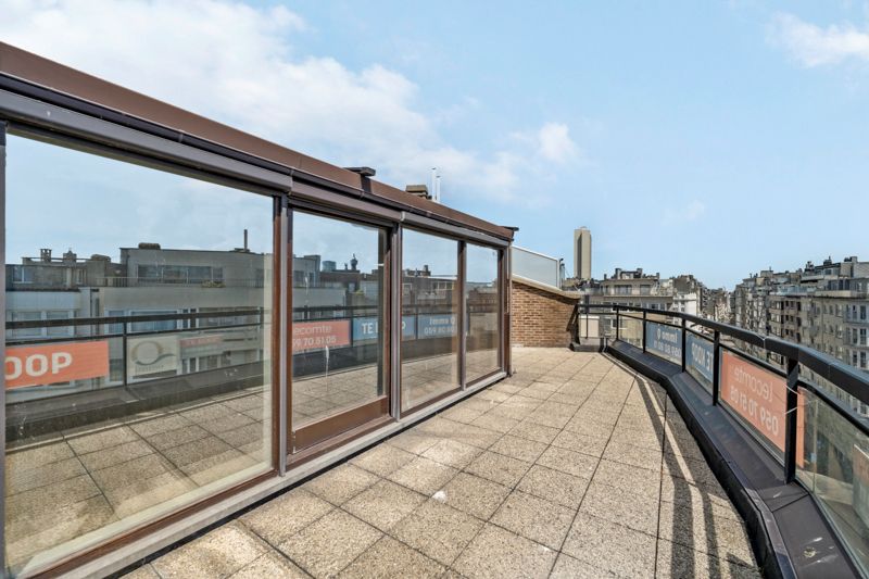 Schitterend gelegen 1 slpk penthouse met royaal dakterras foto 4