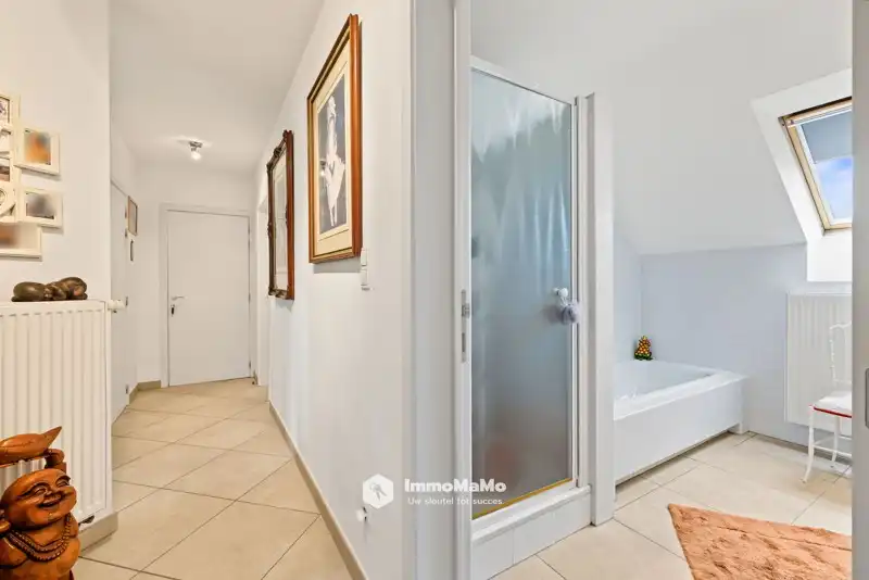 RUIM DAKAPPARTEMENT MET 3 GARAGES EN ZALIG DAKTERRAS TE KOOP foto 14