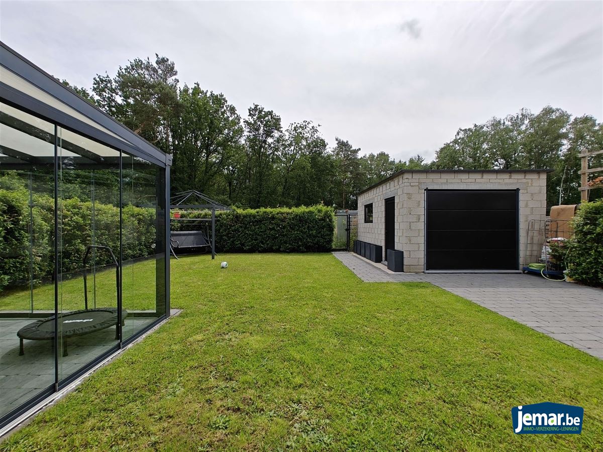 Perfect afgewerkte woning met 5 slaapkamers en 3 badkamers aan de rand van het bos  foto 15