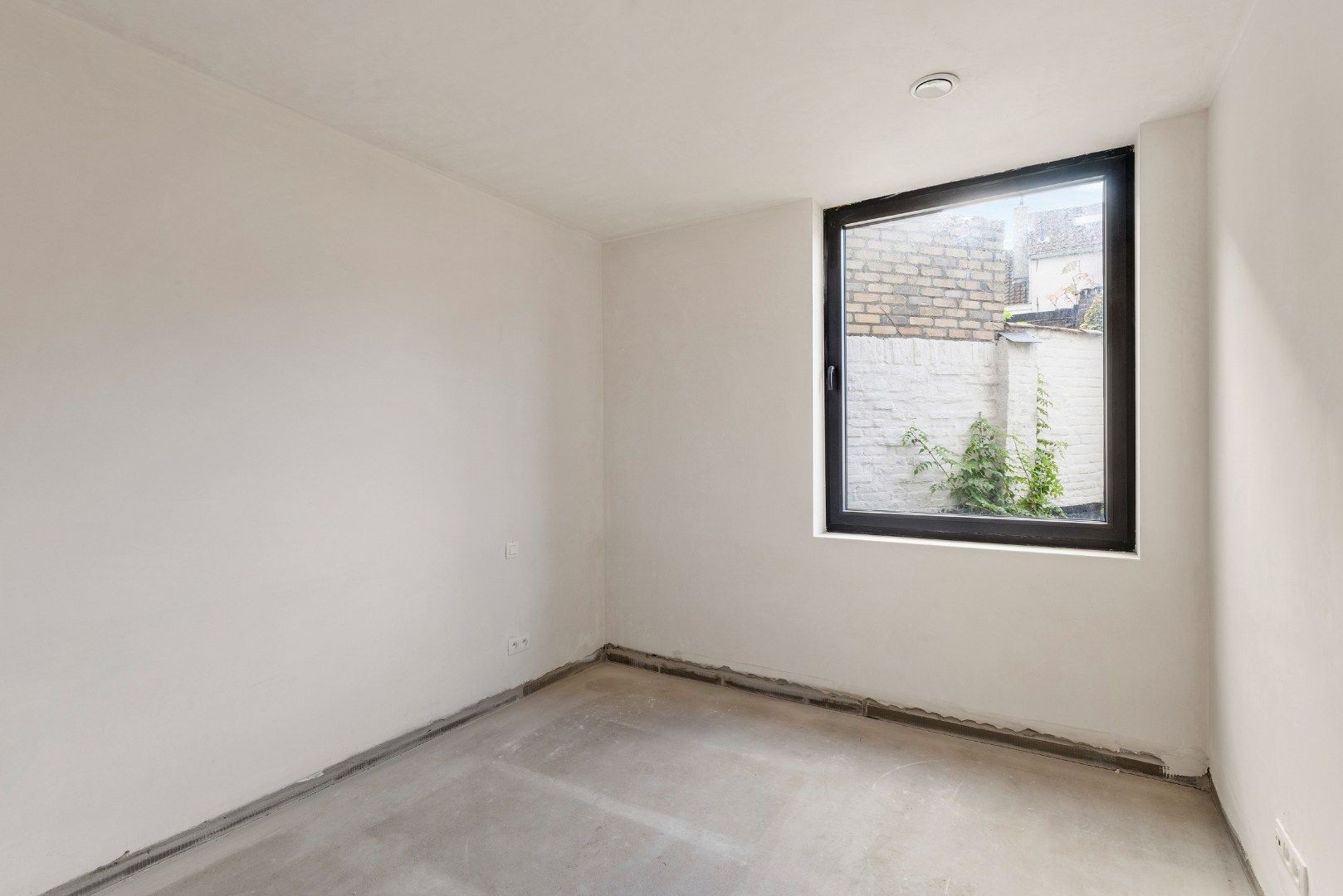 af te werken kangoeroewoning met binnentuin binnen de Brugse Reien foto 28