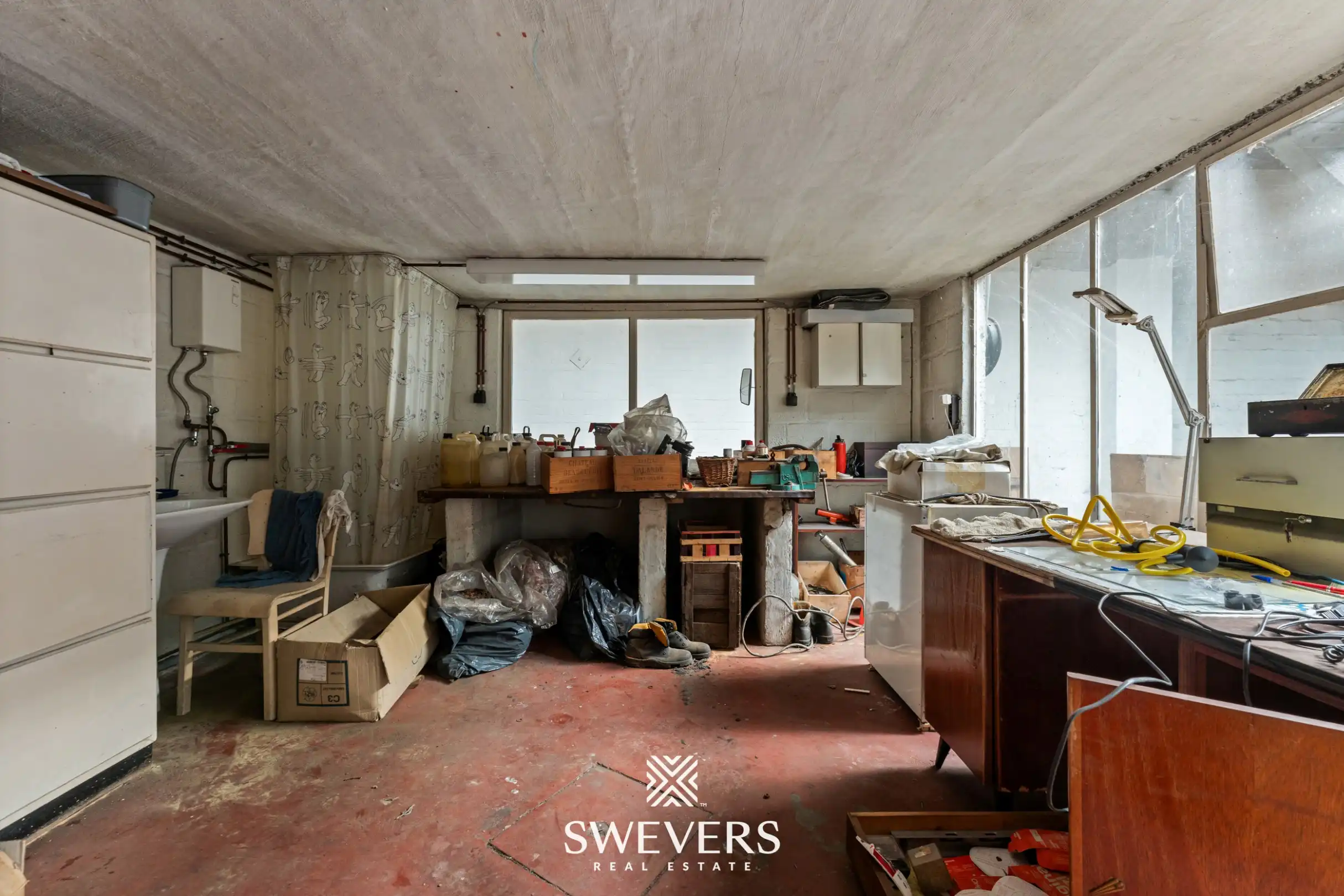 Ruime gezinswoning met multifunctionele loods op commerciële toplocatie foto 33