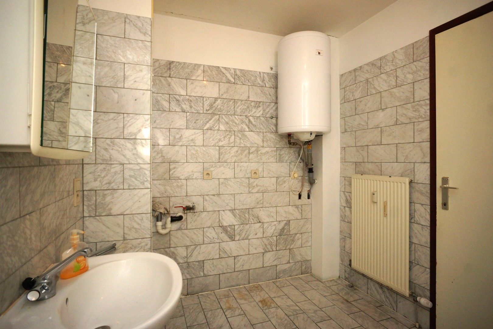 Ruim appartement met 3 slaapkamers gelegen tegenover de kerk van Wiemesmeer foto 10