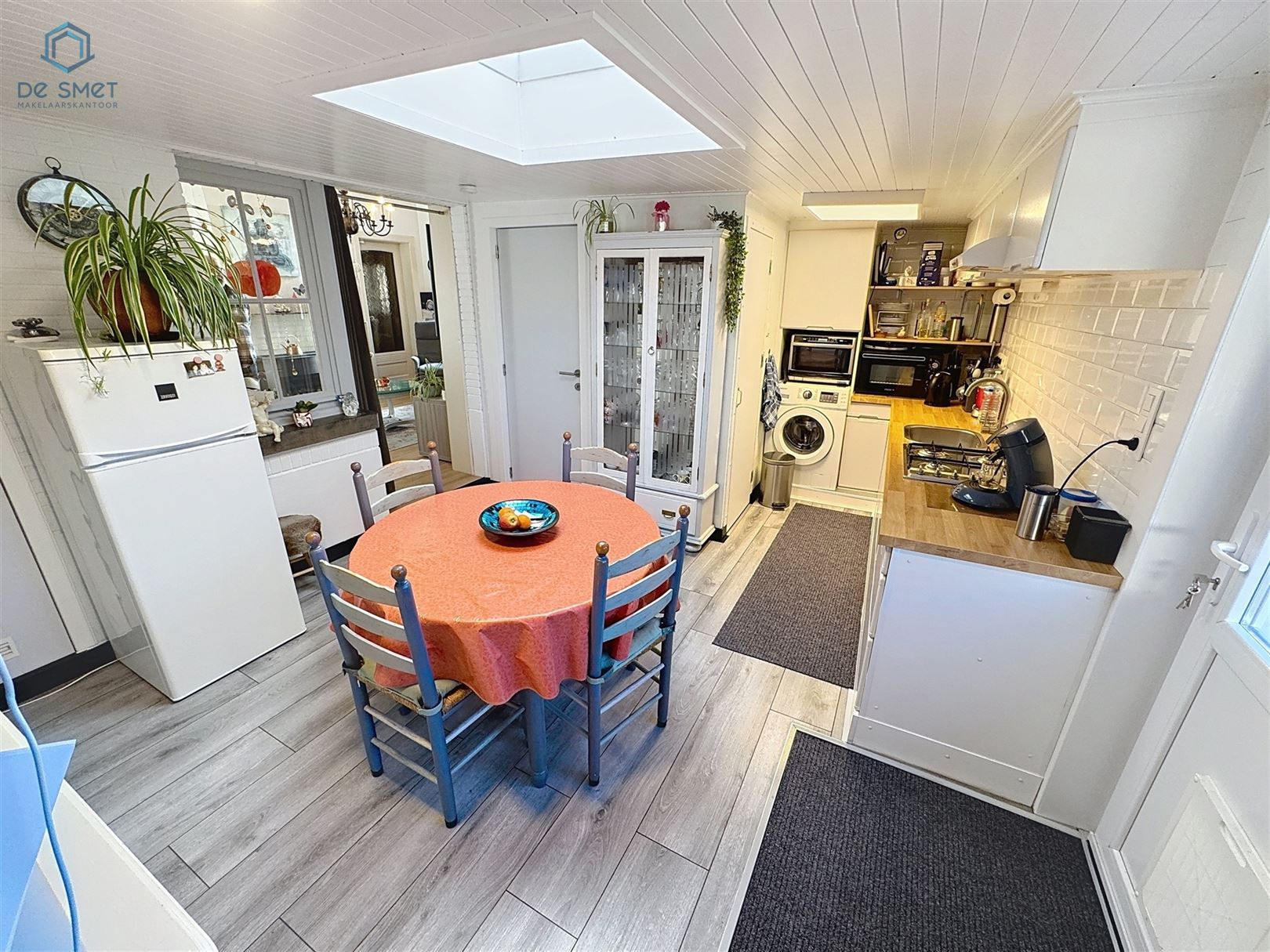 Instapklare woning met 3 slaapkamers, stadstuintje, berging en carport in rustige straat nabij centrum Brakel foto 3