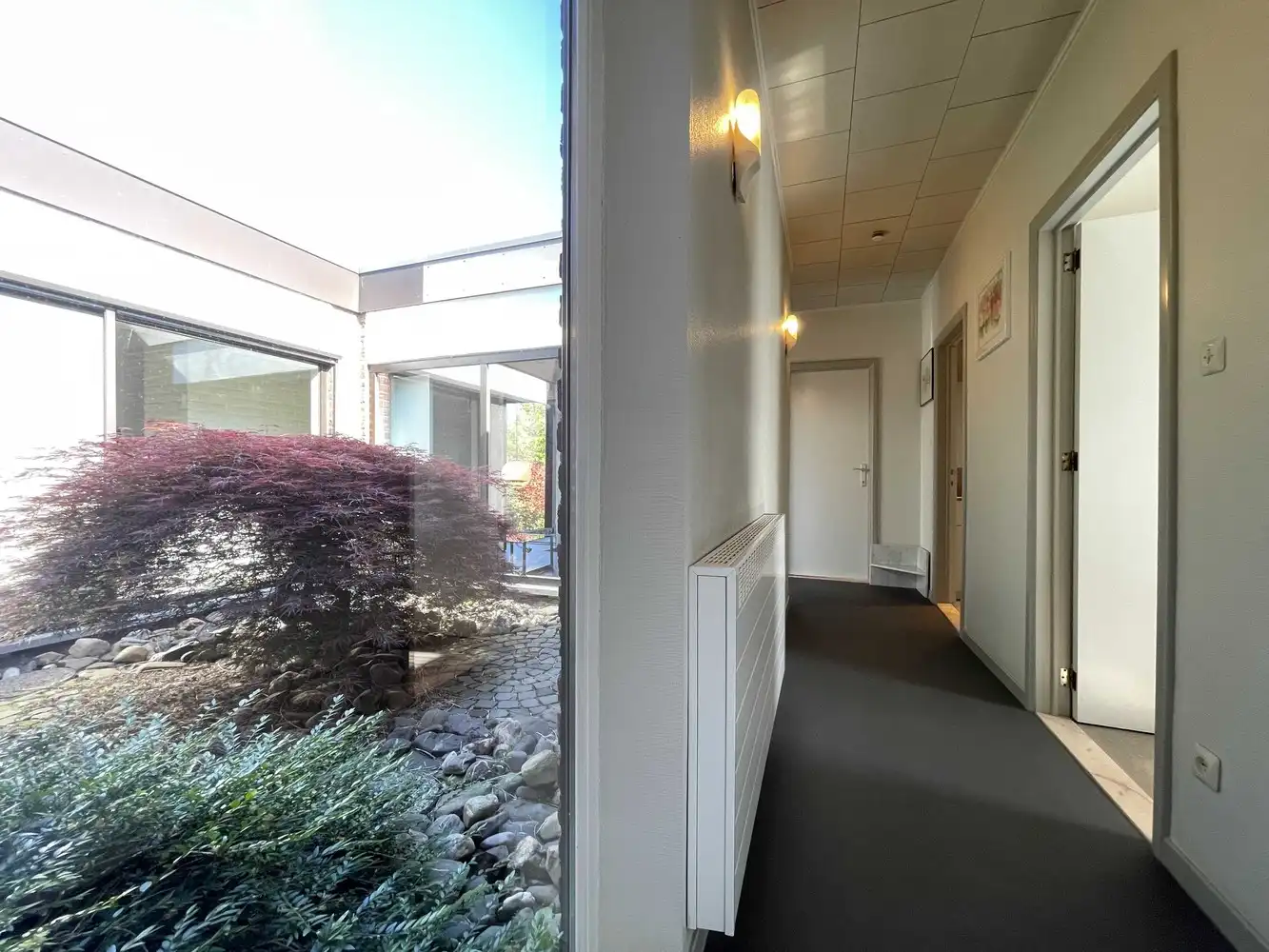 Rustig gelegen vrijstaande woning met zonovergoten tuin foto 19