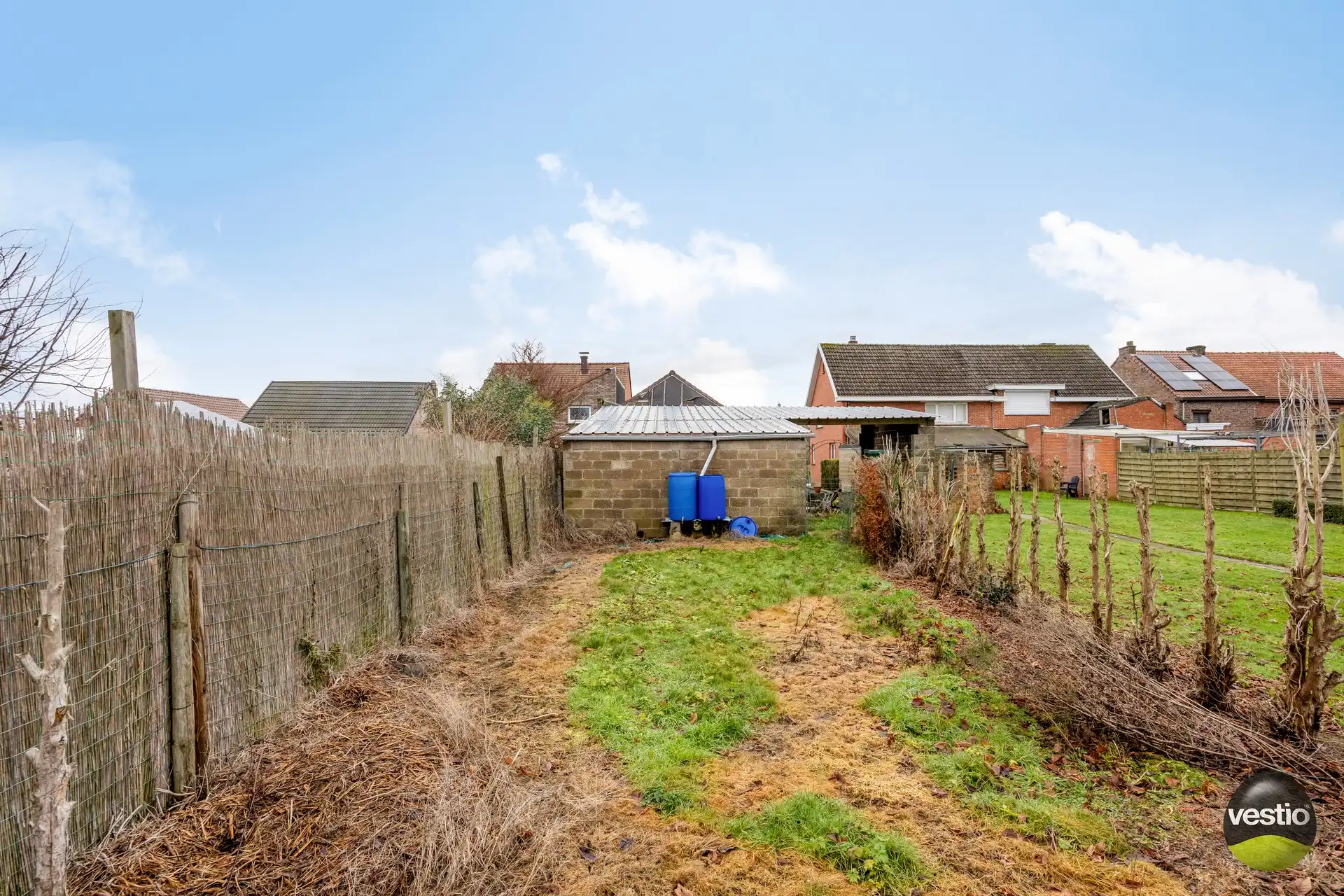 Te renoveren woning met bijgebouwen in het rustige centrum van Bevingen (Sint-Truiden) foto 7