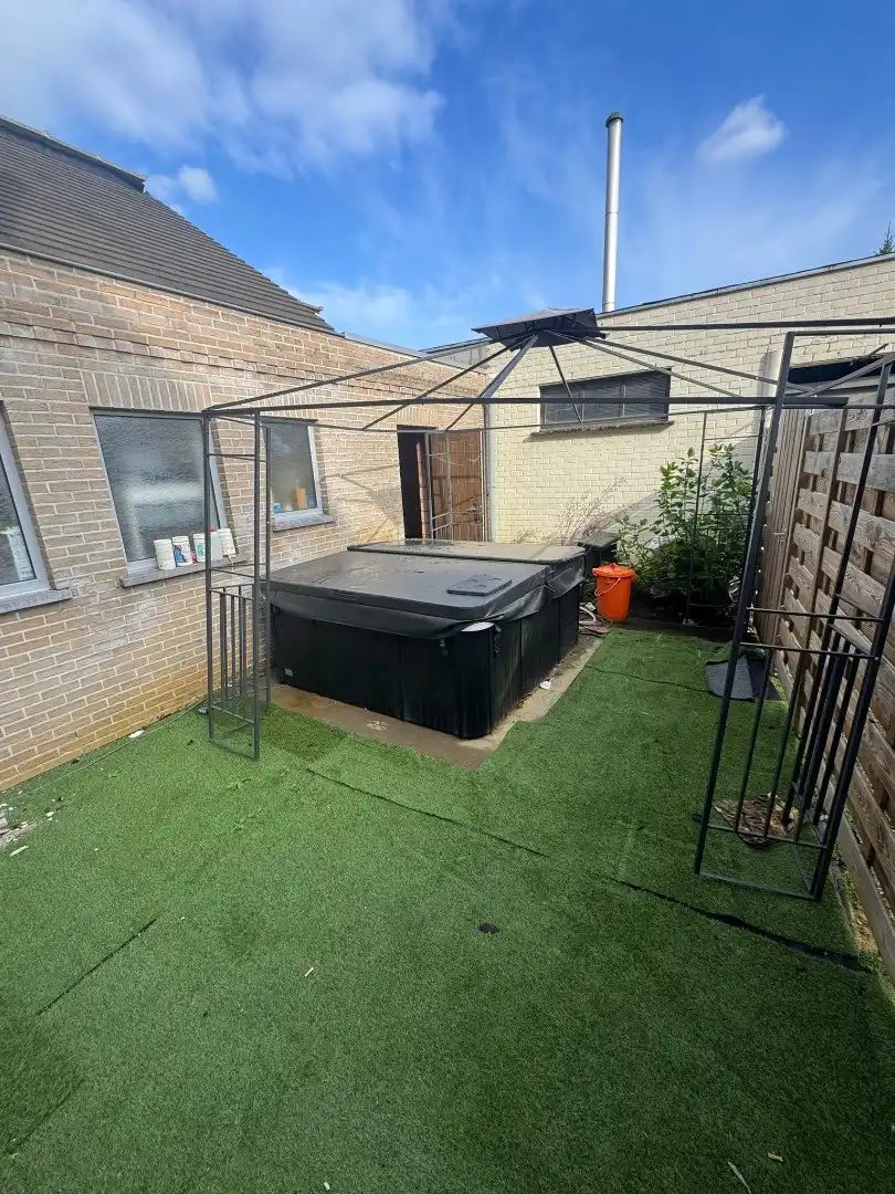 Gezinsvriendelijk duplex appartement met tuin foto 16