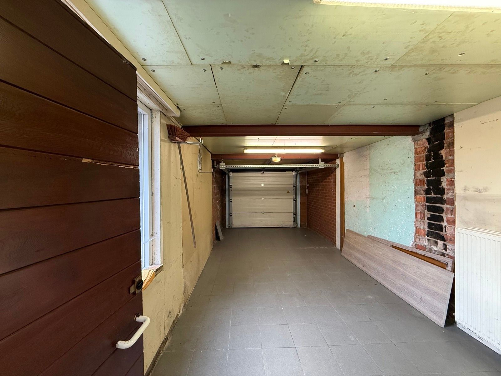 Half open woning met 4 slaapkamers, tuin en garage foto 27