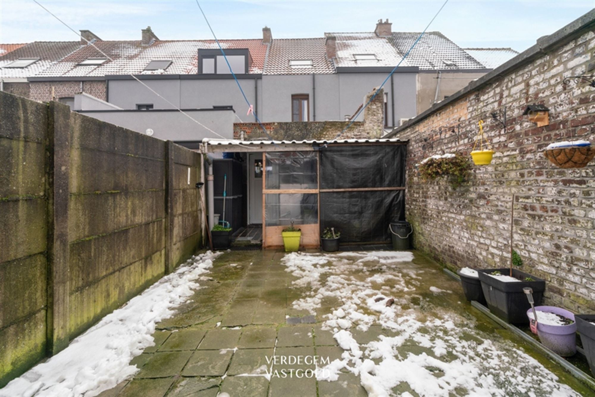 Centraal gelegen rijwoning met 4 slaapkamers en stadstuintje foto 17