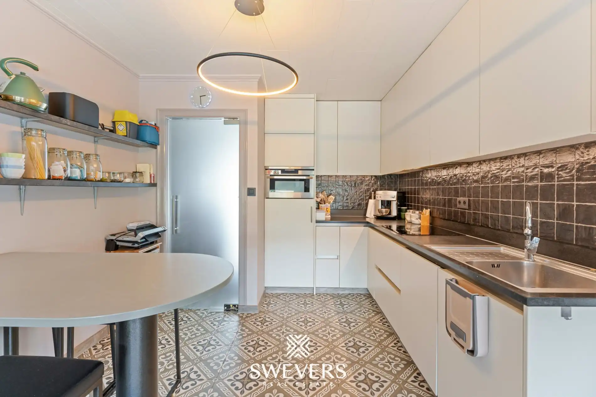 Instapklare gelijkvloerse woning met onderhoudsvriendelijke tuin op centrale locatie in Diepenbeek foto 11