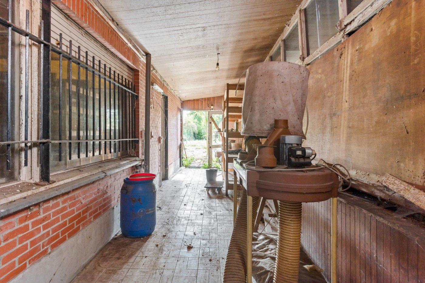 Te renoveren woning met 2 slpk., garage en grote tuin foto 14