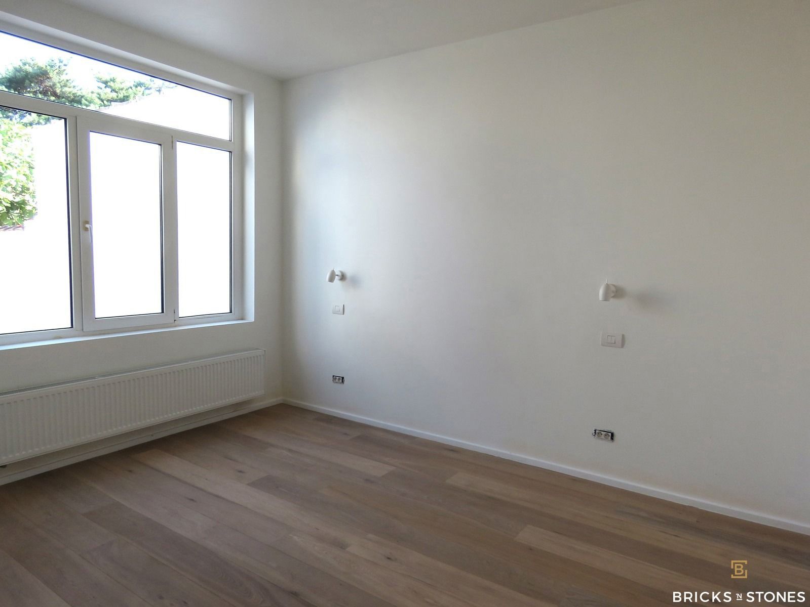 Gerenoveerd appartement met 2 slaapkamers, tuin en garage !  foto 7