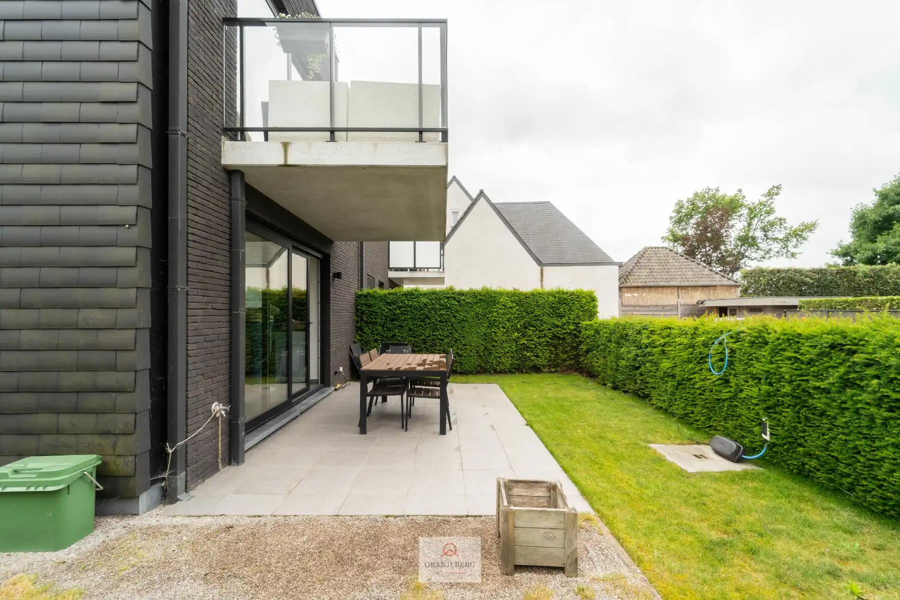 Gelijkvloers 2 slaapkamerappartement met ruime tuin foto 14
