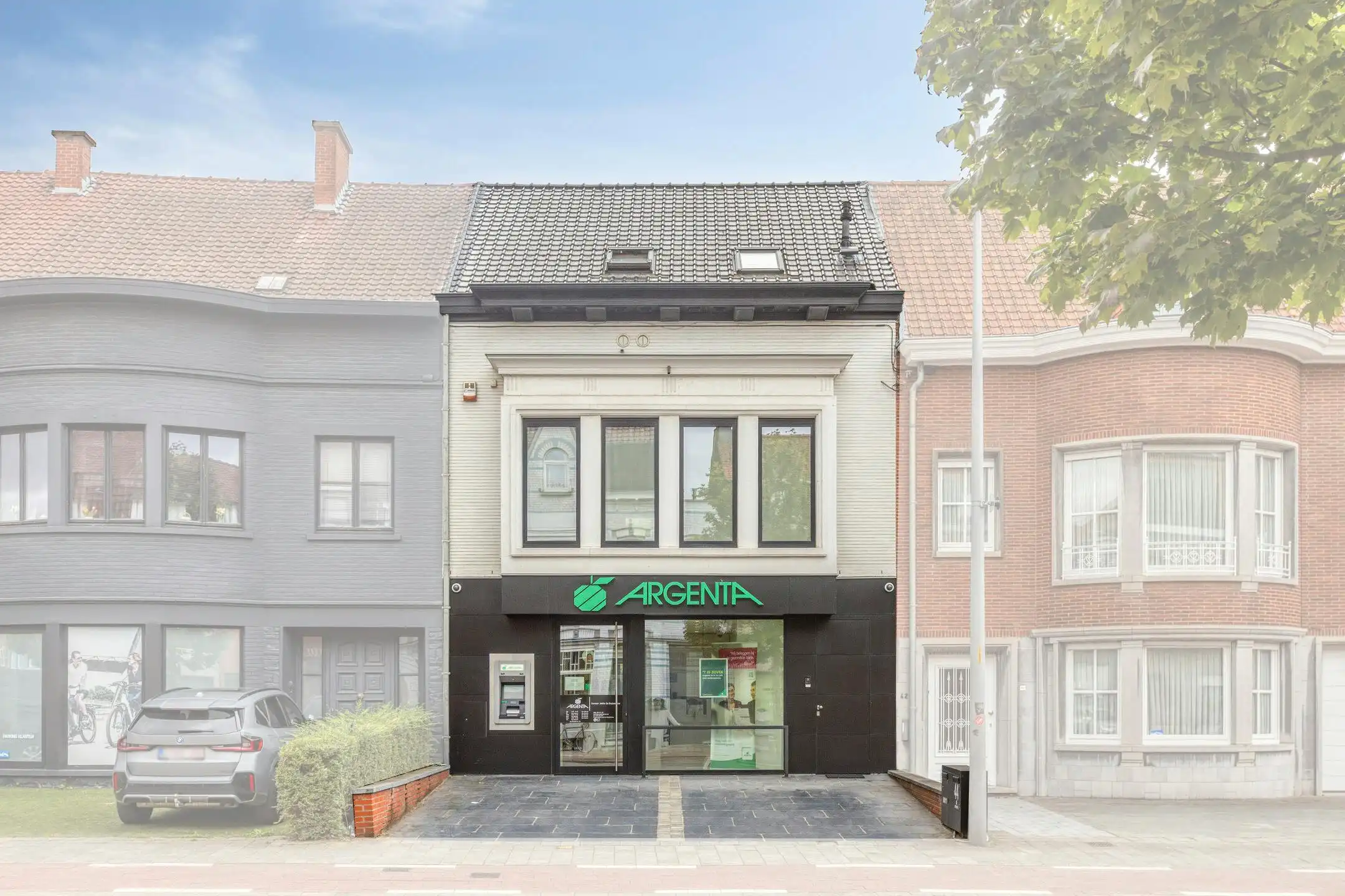 Verhuurde opbrengsteigendom met handelsruimte en duplex  foto 2