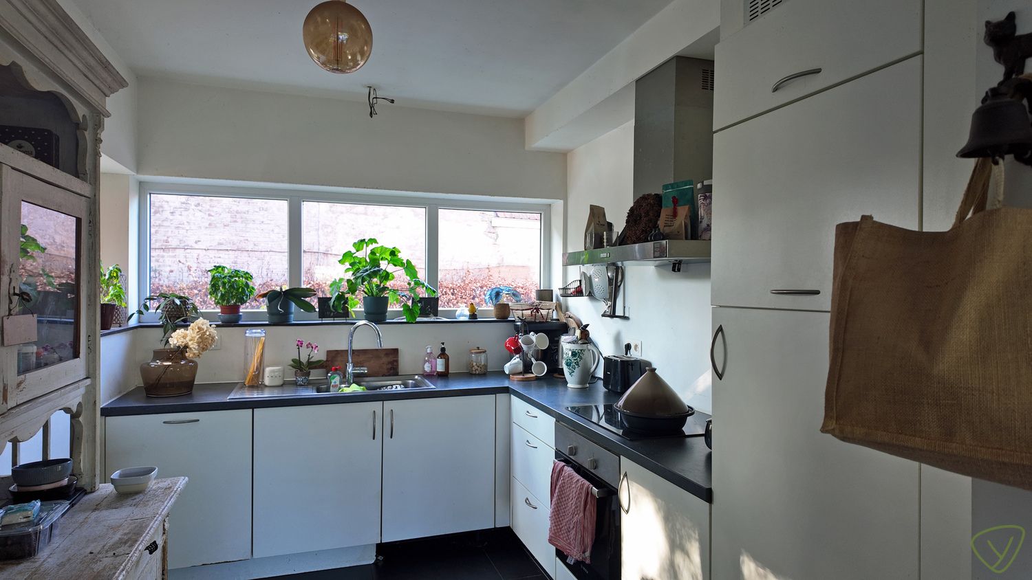 Recente gezinswoning met zonnige tuin, garage en centrale ligging! foto 4