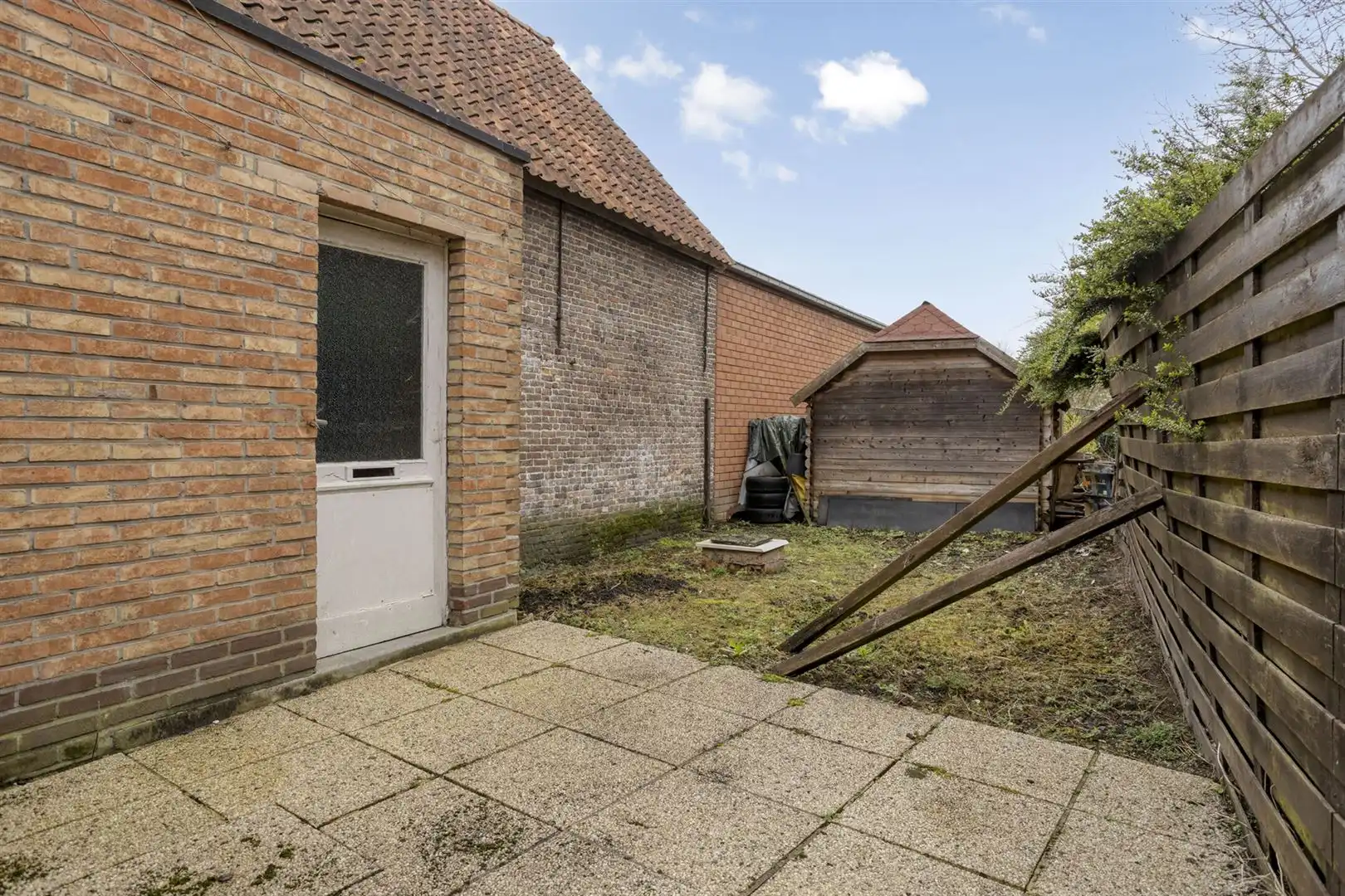 Te renoveren woning gelegen aan het plein in Kaprijke ! foto 16