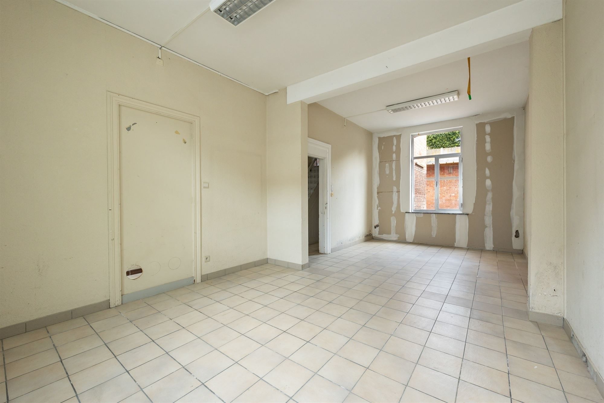 Gunstig gelegen renovatiewoning met 2 tot 4 slaapkamers foto 3