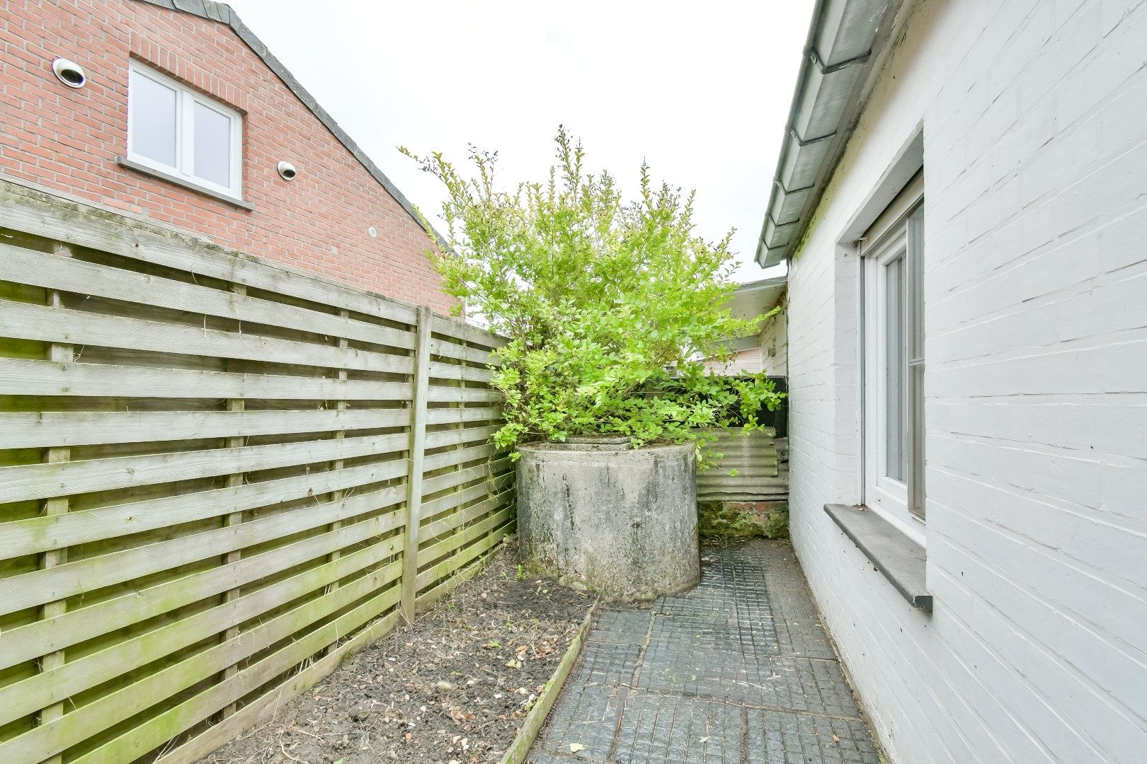 Knusse woning nabij het centrum van Torhout! foto 8