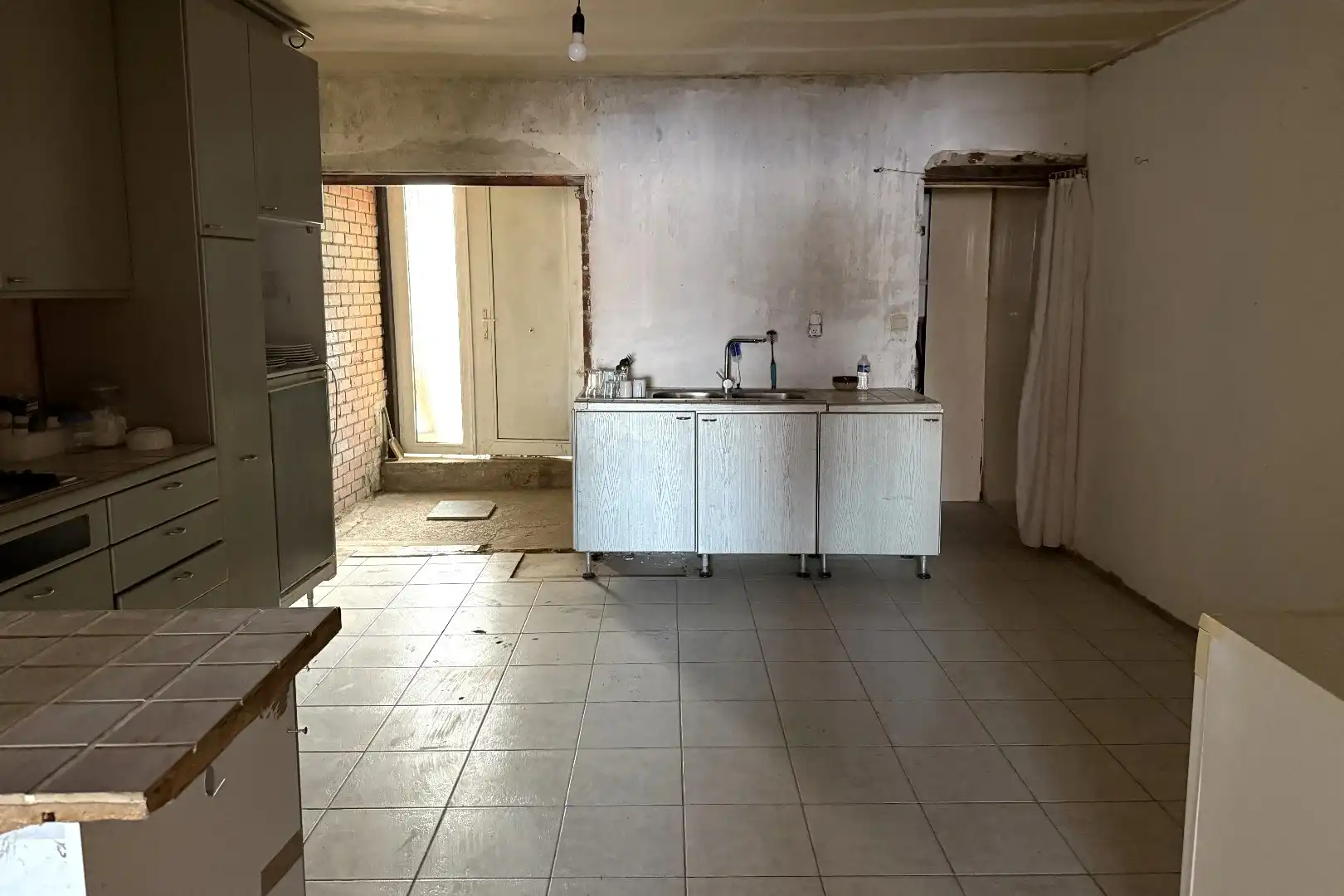 Dubbelwoonst met diepe tuin, rustig gelegen op 2km van de Grote Markt van Tongeren foto 8