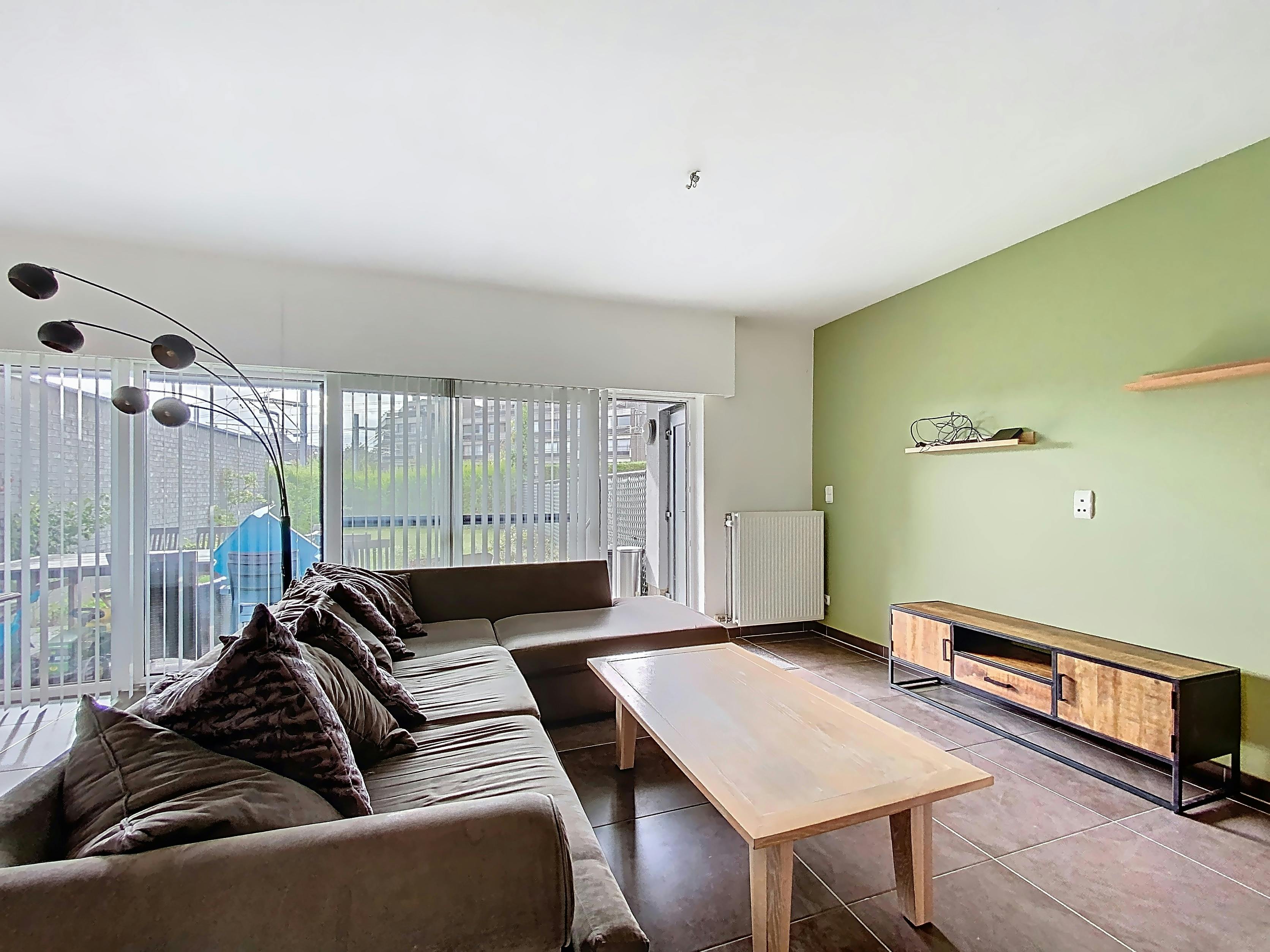 Gezellig gelijkvloers appartement met 2 slaapkamers en tuin foto 5