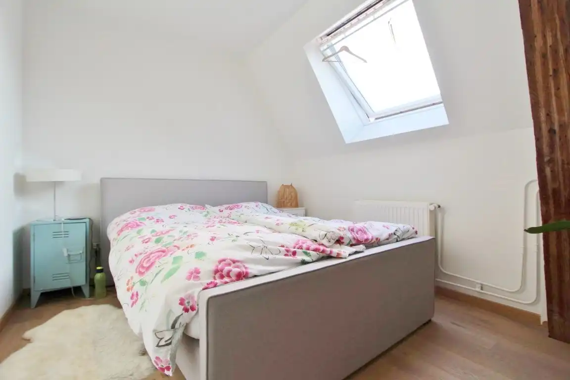 Gezellige triplex op toplocatie met 2 slaapkamers, terras en ondergrondse autostaanplaats foto 20