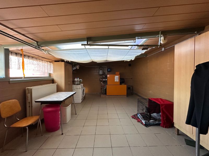Ruime gezinswoning met grote tuin, veranda en veel opbergruimte foto 15