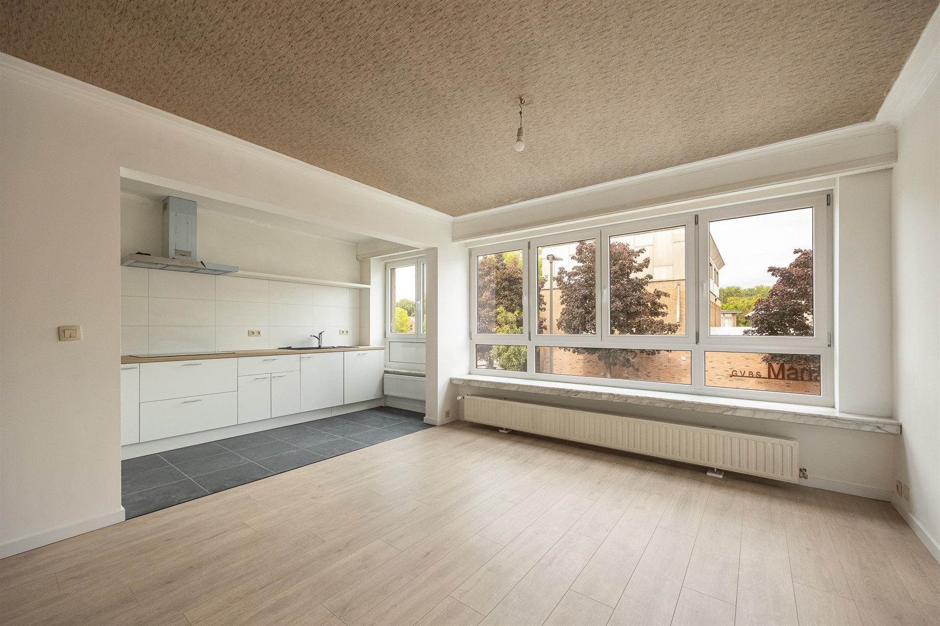 Gelijkvloerse instapklare duplex met tuin en mogelijkheid tot Praktijkruimte in Borgerhout Extra Muros foto 4