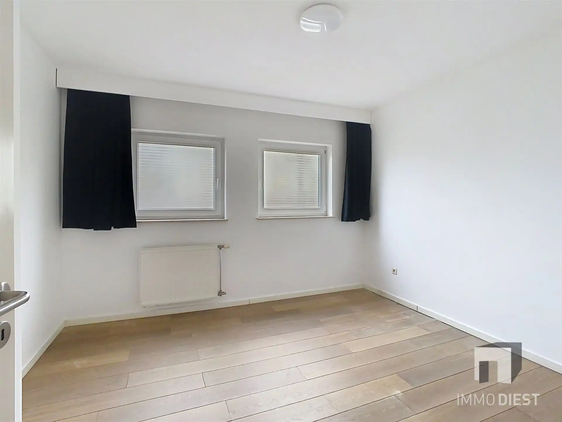 Gelijkvloers appartement met ingesloten koertje foto 6