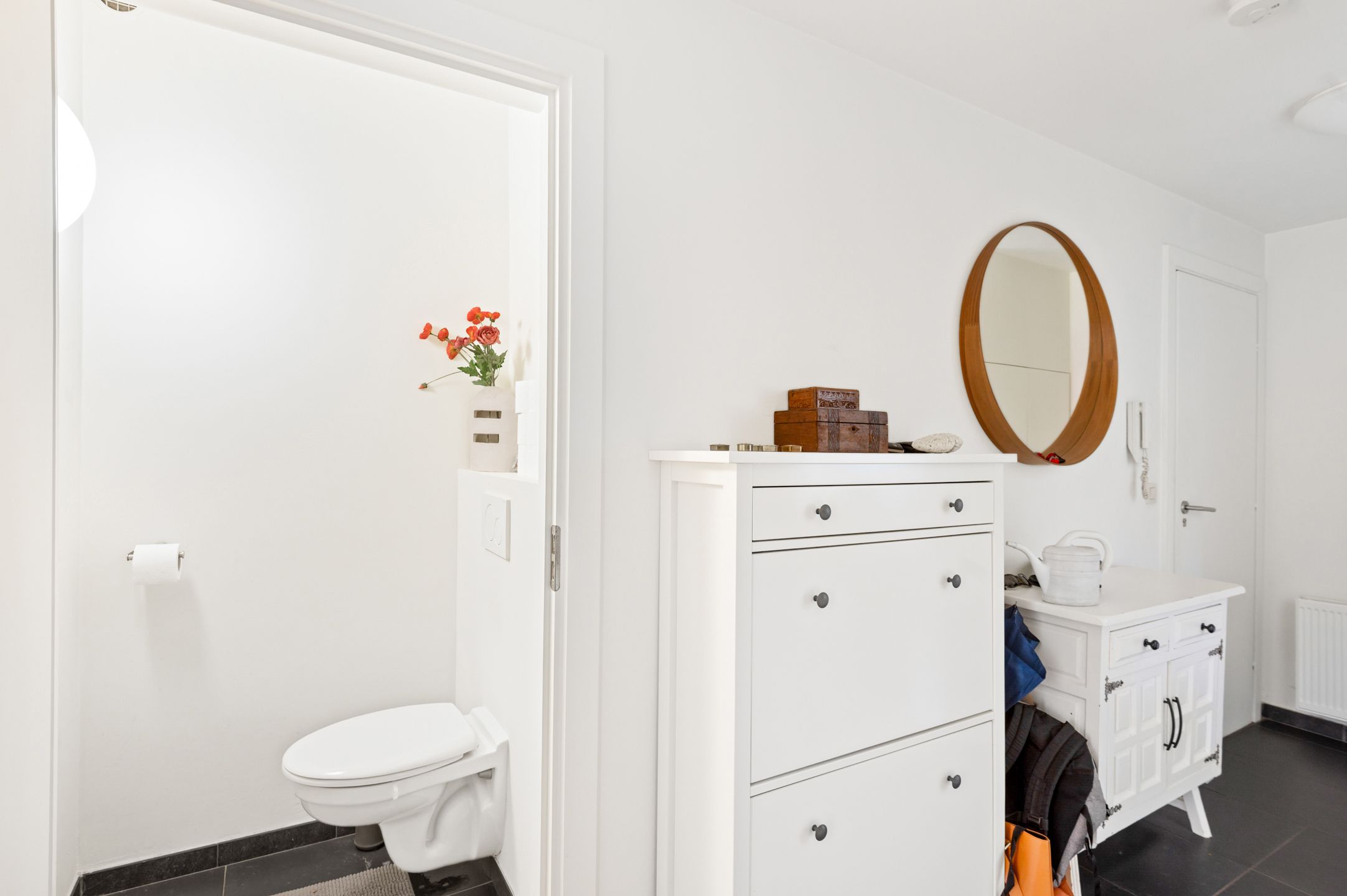 Mooi gelijkvloers appartement met 2 slk., tuin en garagebox foto 10