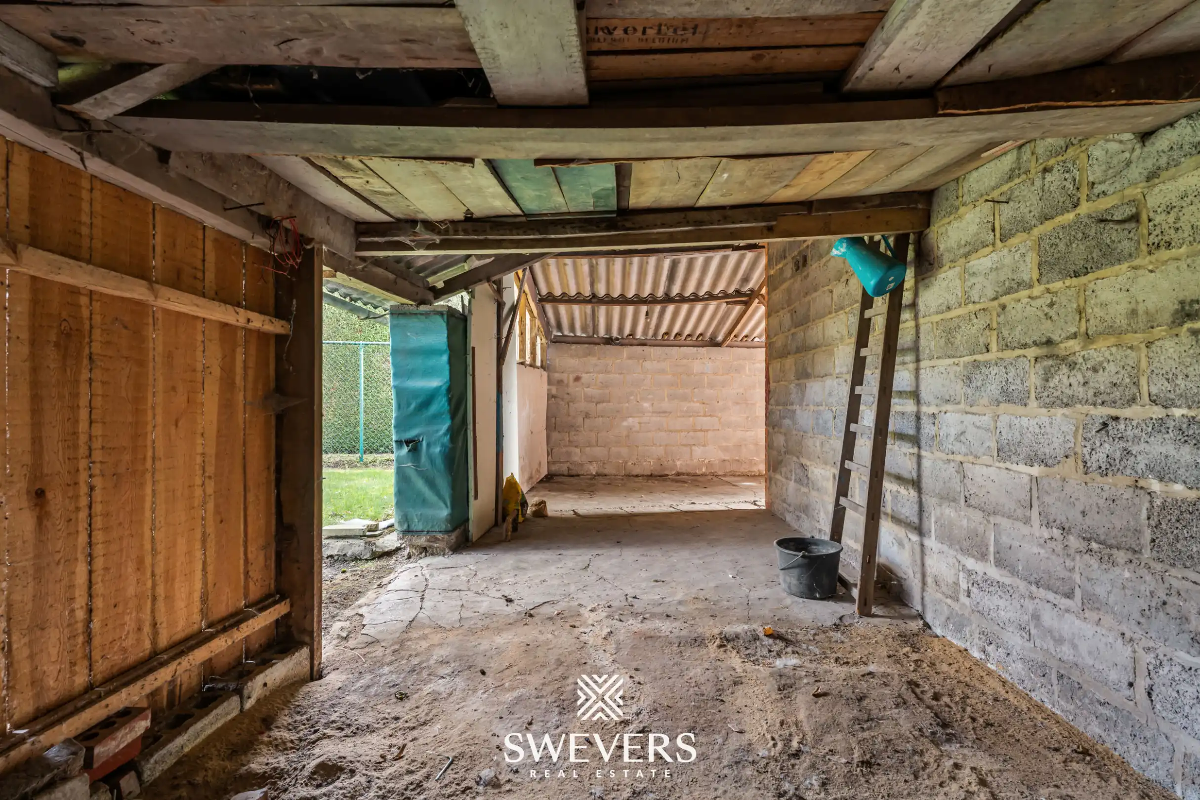 Woning met veel potentieel en ruime tuin in Borgloon foto 30