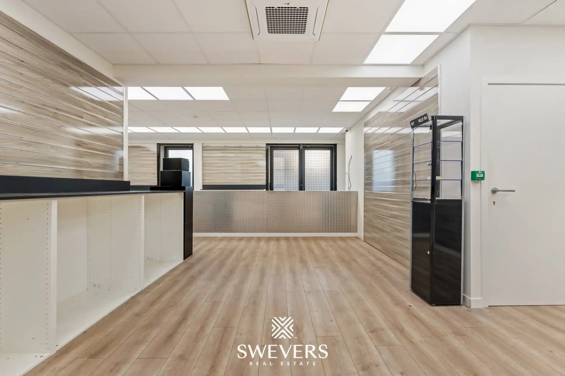 Uitzonderlijke mooi gelegen en ruime (391m²) handelsruimte in het volle centrum van Leopoldsburg foto 18