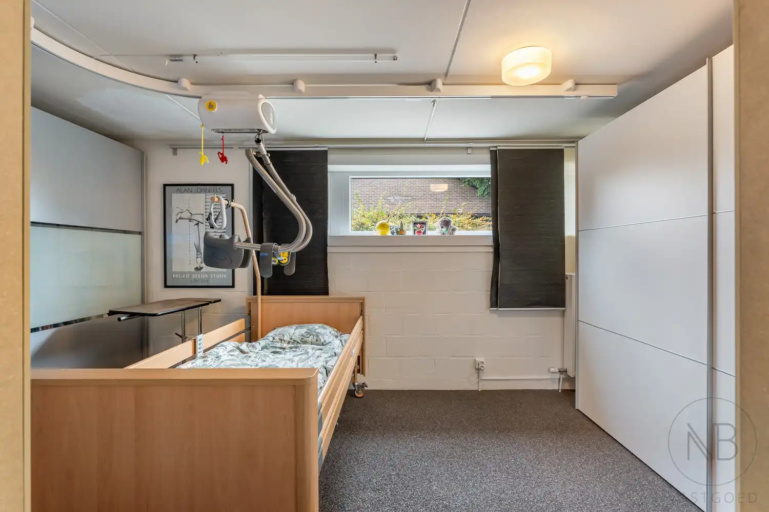 Pand met vergunde praktijkruimte, woonst, garage en carport in Opglabbeek foto 6