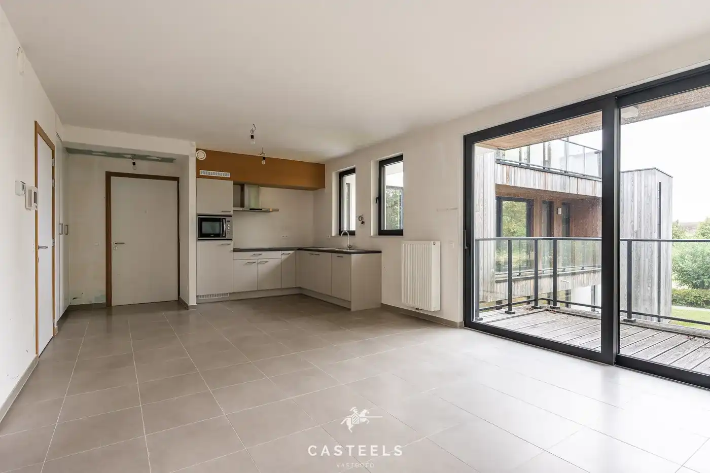 Lichtrijk nieuwbouw hoek appartement met terras te Kluisbergen foto 4