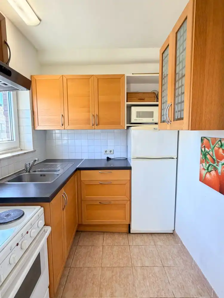 Instapklaar 2-slaapkamerappartement met terras en garagebox foto 4