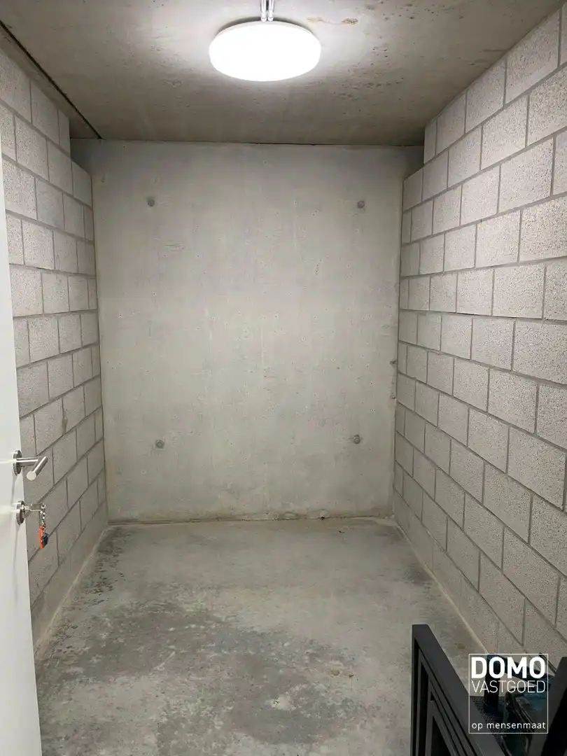 Penthouse met twee slaapkamers, ruim terras en autostandplaats te Kermt foto 15