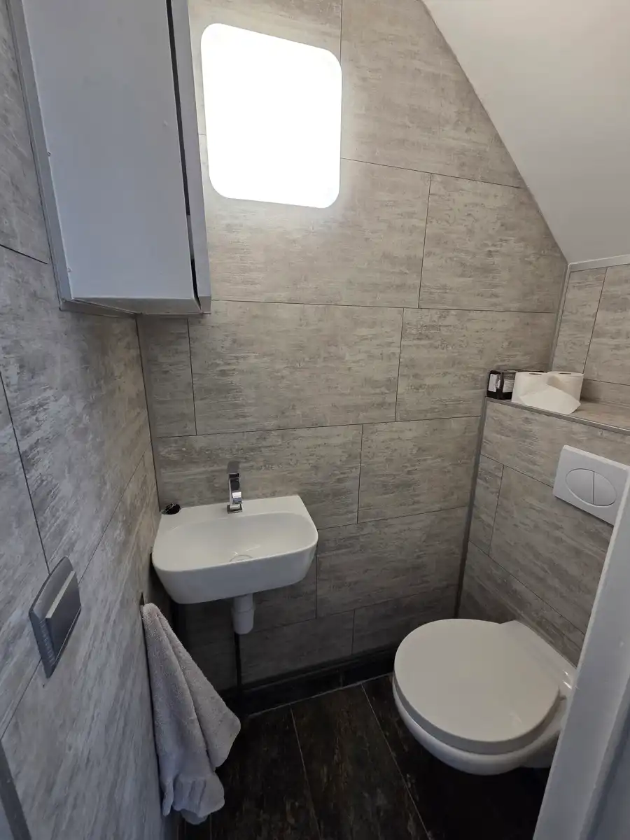 Ruime en charmante gezinswoning met drie slaapkamers foto 10