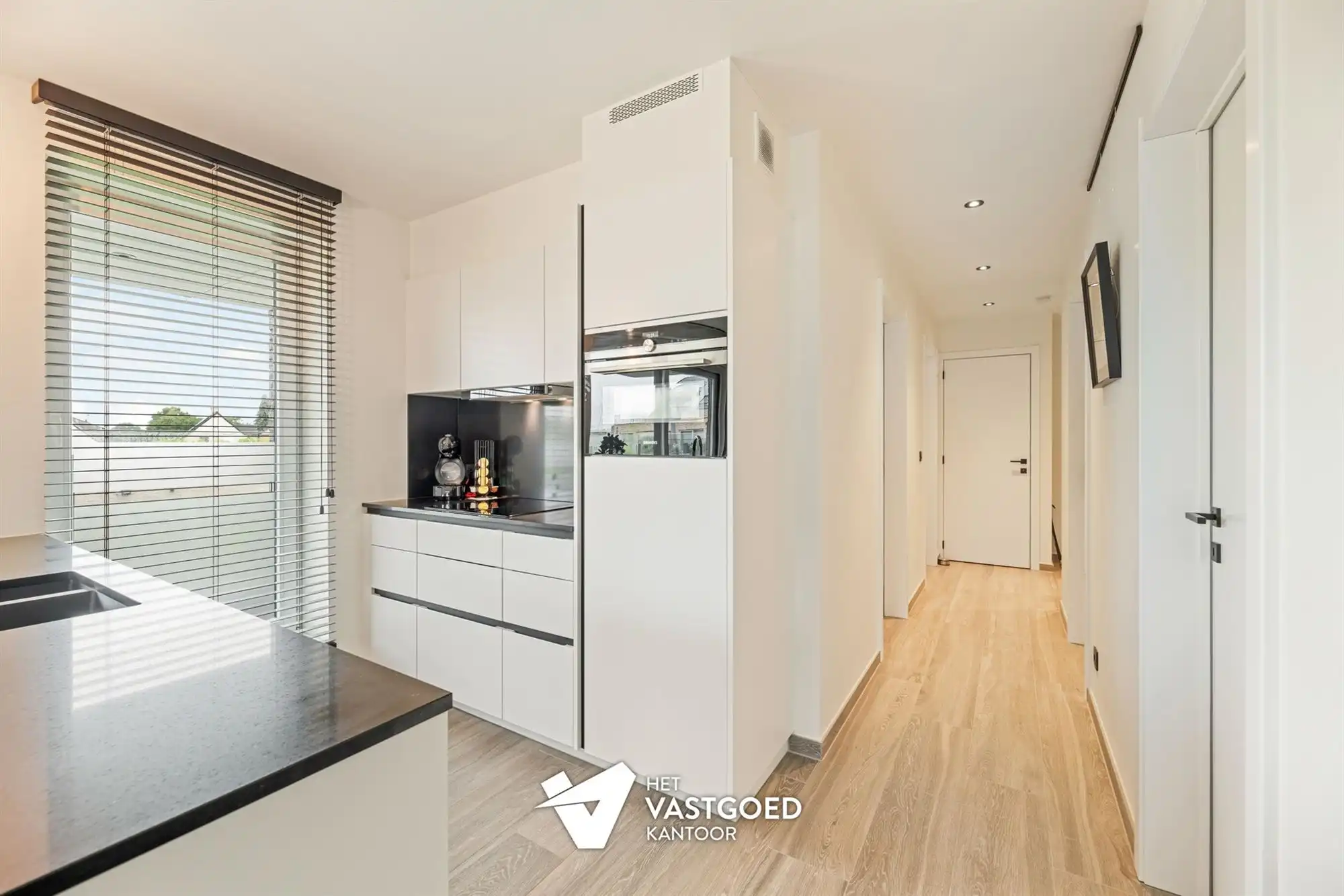 RECENT APPARTEMENT (87M²) MET 2 SLAAPKAMERS, TERRAS, GARAGE MET APARTE BERGING EN CARPORT TE HULSHOUT foto 14