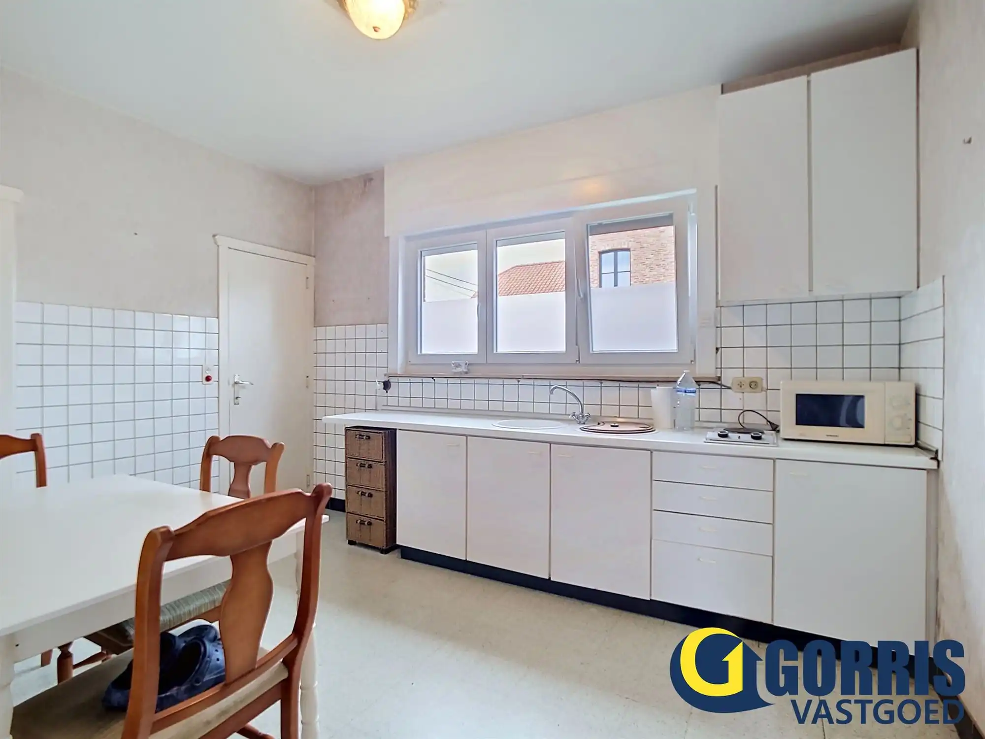 Te renoveren woning met ruime tuin in het centrum van Hulshout foto 10