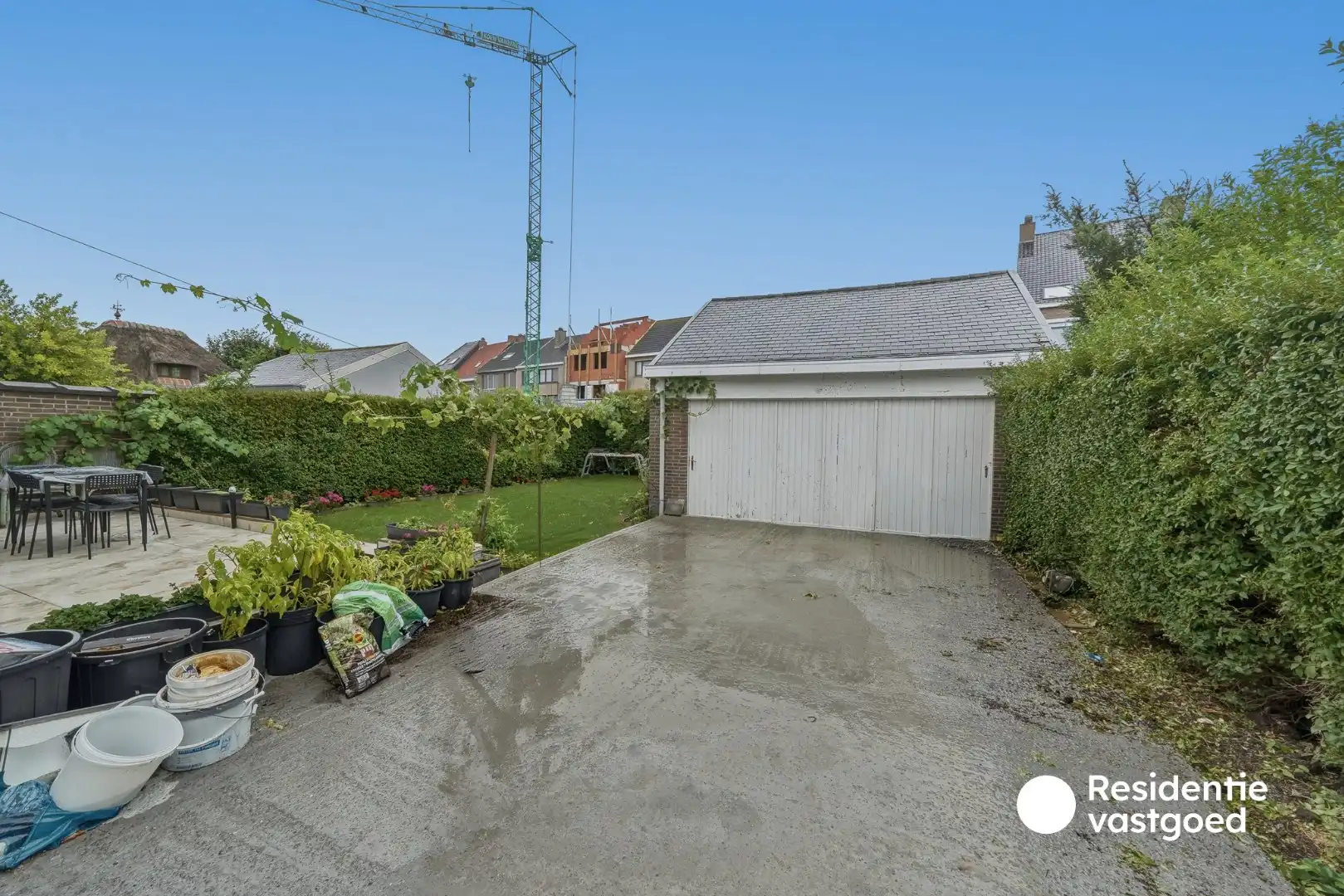 Halfopen woning met tuin en garage te koop foto 5