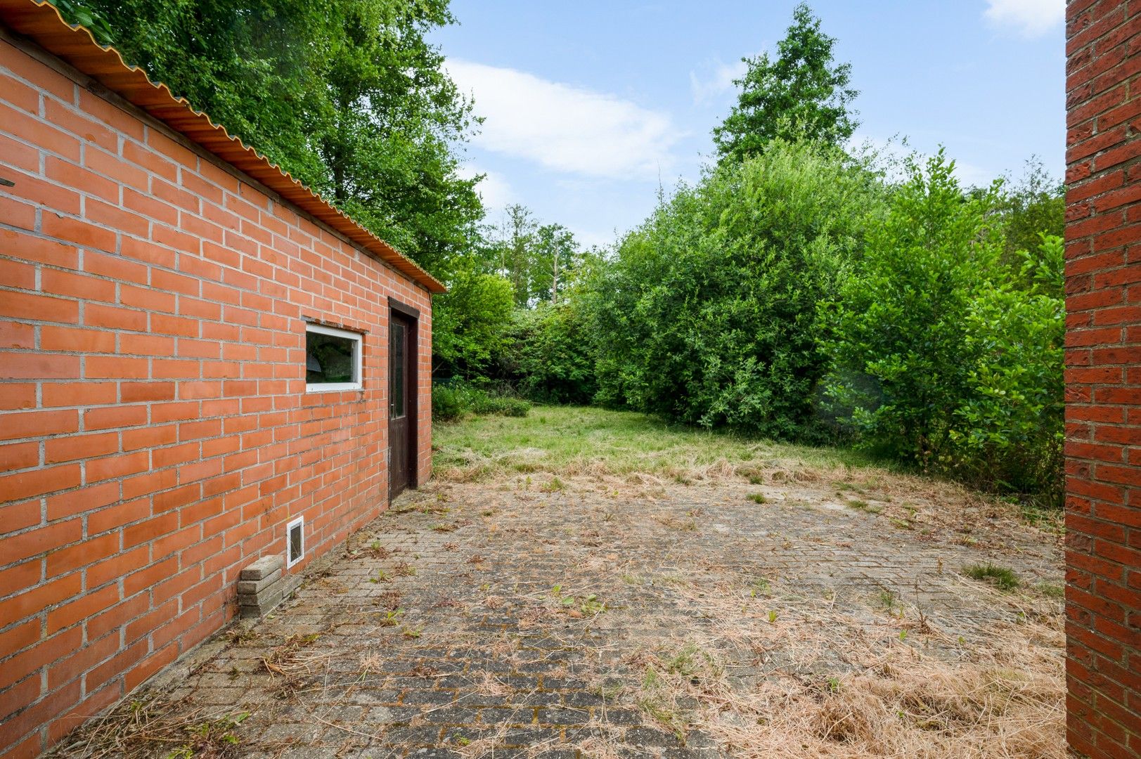 Te renoveren woning met tuin en garage in Wolfsdonk! foto 20