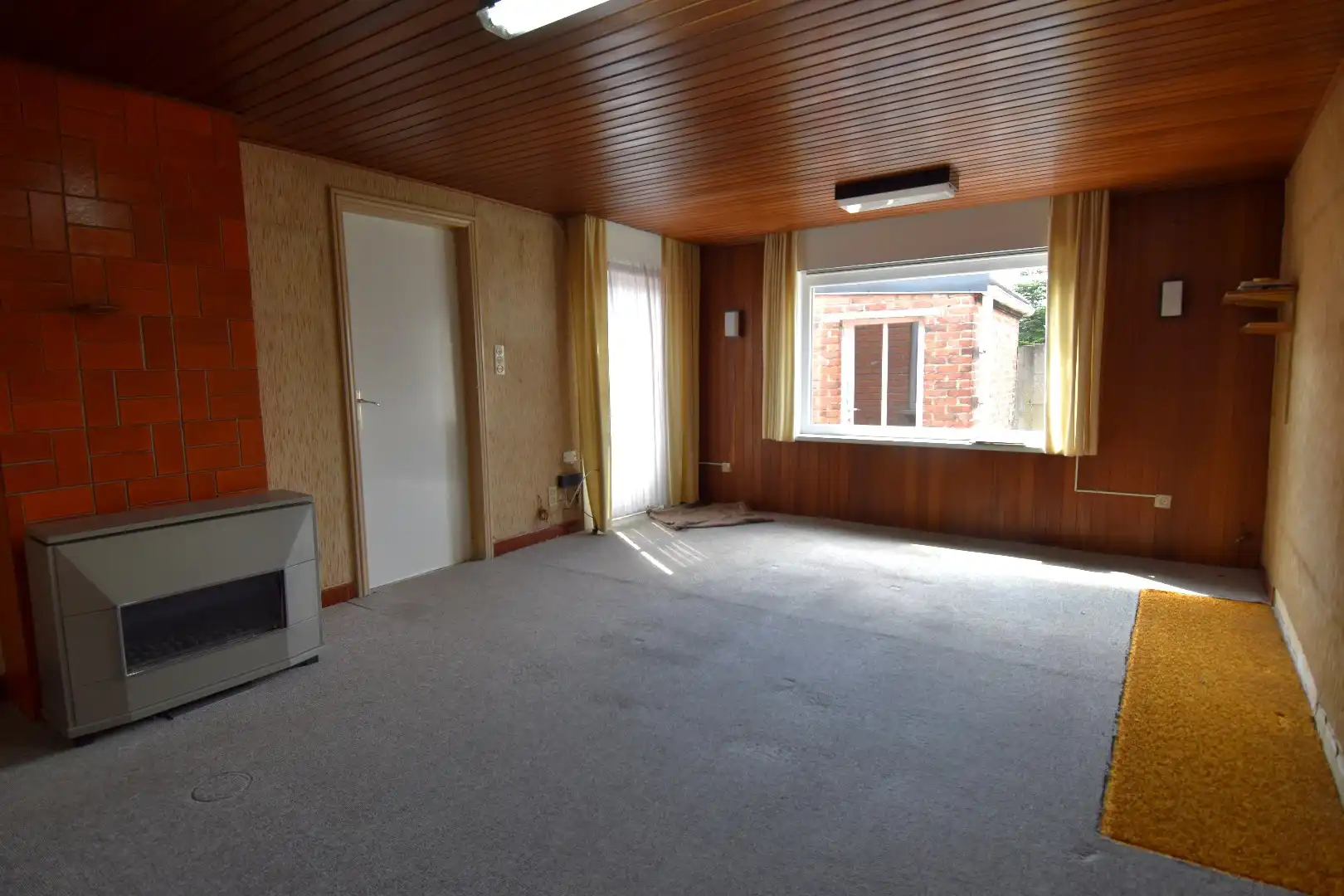 Woning met veel potentieel, garage en charmante tuin te koop in Kuurne foto 4