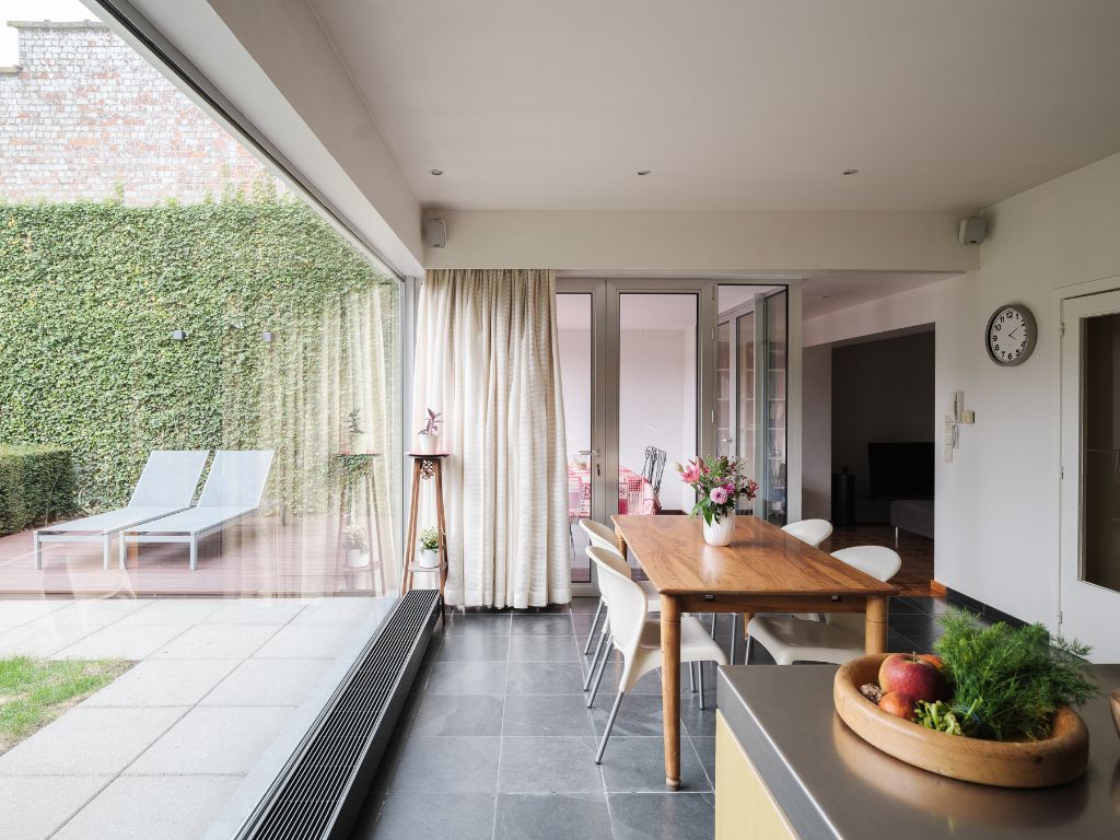 Bijzonder ruime & karaktervolle burgerwoning met zonnige stadstuin en extra bijwoonst in een hippe en opkomende buurt nabij Dok Noord. foto 10