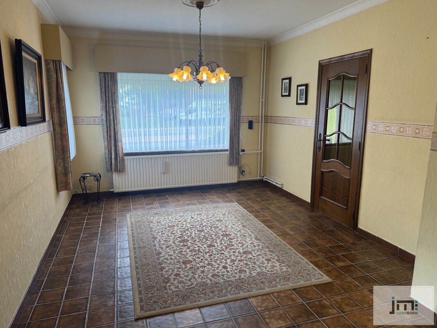 Goed onderhouden woning met ruime tuin foto 3