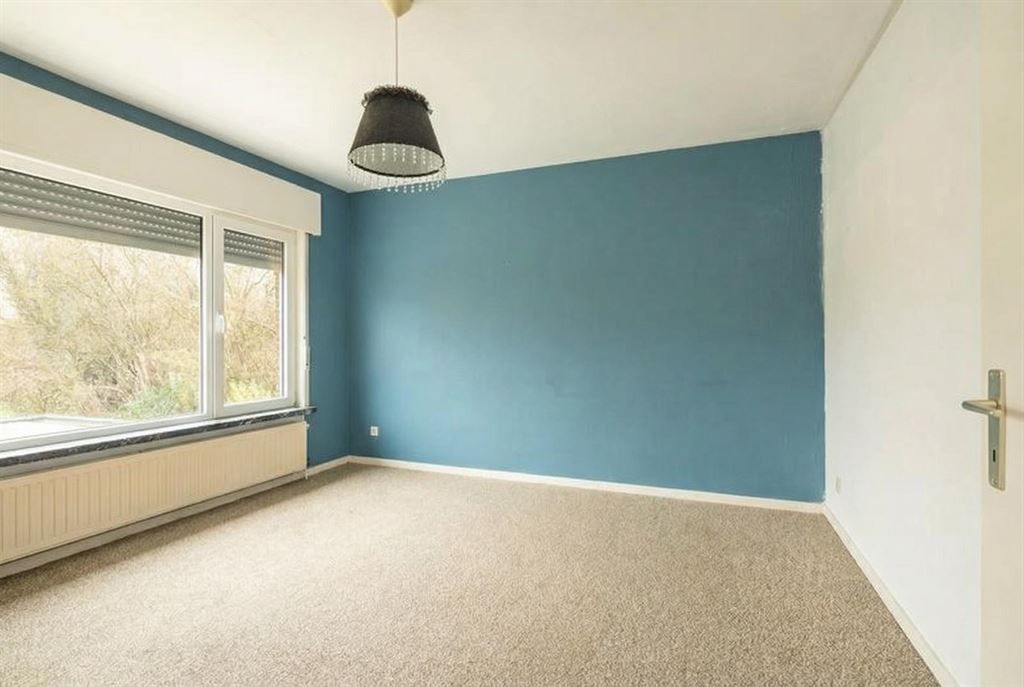 Te renoveren woning met achterliggend weiland foto 10