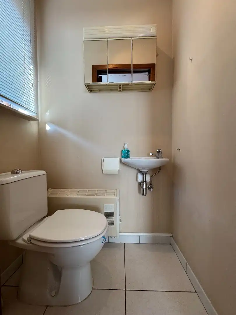 Een ruime 3-gevelwoning met tuin en garage foto 10